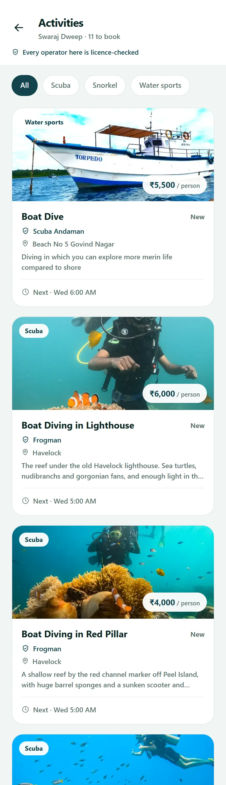 The activities list on Swaraj Dweep: scuba and boat dives with photos, operator names, prices and next departure times.